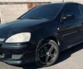 Черный Опель Корса, объемом двигателя 1.2 л и пробегом 190 тыс. км за 4400 $, фото 1 на Automoto.ua
