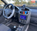 Черный Опель Корса, объемом двигателя 1.2 л и пробегом 188 тыс. км за 2350 $, фото 13 на Automoto.ua