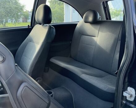 Черный Опель Корса, объемом двигателя 1 л и пробегом 140 тыс. км за 2300 $, фото 8 на Automoto.ua