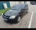 Черный Опель Корса, объемом двигателя 1.2 л и пробегом 246 тыс. км за 3296 $, фото 1 на Automoto.ua