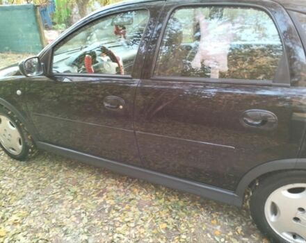 Черный Опель Корса, объемом двигателя 1.2 л и пробегом 220 тыс. км за 3600 $, фото 6 на Automoto.ua