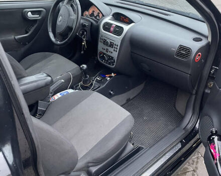 Чорний Опель Корса, об'ємом двигуна 1.2 л та пробігом 240 тис. км за 2800 $, фото 5 на Automoto.ua