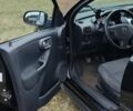 Черный Опель Корса, объемом двигателя 1.36 л и пробегом 206 тыс. км за 2900 $, фото 4 на Automoto.ua