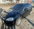 Черный Опель Корса, объемом двигателя 1.2 л и пробегом 245 тыс. км за 2300 $, фото 1 на Automoto.ua