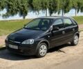 Черный Опель Корса, объемом двигателя 1.2 л и пробегом 203 тыс. км за 3000 $, фото 1 на Automoto.ua