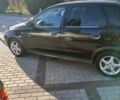 Черный Опель Корса, объемом двигателя 1.2 л и пробегом 260 тыс. км за 3200 $, фото 1 на Automoto.ua