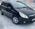 Черный Опель Корса, объемом двигателя 1.23 л и пробегом 184 тыс. км за 4600 $, фото 1 на Automoto.ua