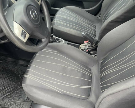 Черный Опель Корса, объемом двигателя 1.2 л и пробегом 210 тыс. км за 3200 $, фото 16 на Automoto.ua