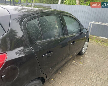 Черный Опель Корса, объемом двигателя 1.25 л и пробегом 309 тыс. км за 3500 $, фото 4 на Automoto.ua