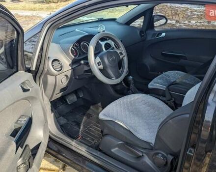 Черный Опель Корса, объемом двигателя 1.4 л и пробегом 253 тыс. км за 5599 $, фото 4 на Automoto.ua