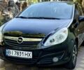 Черный Опель Корса, объемом двигателя 1.2 л и пробегом 198 тыс. км за 4709 $, фото 1 на Automoto.ua
