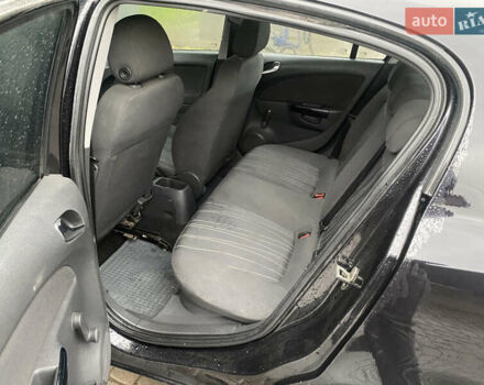 Черный Опель Корса, объемом двигателя 1.25 л и пробегом 309 тыс. км за 3500 $, фото 2 на Automoto.ua