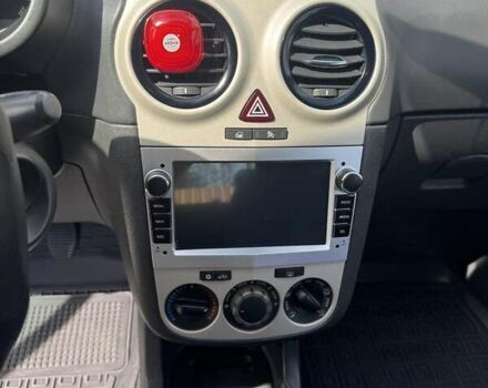 Черный Опель Корса, объемом двигателя 1.23 л и пробегом 230 тыс. км за 4300 $, фото 2 на Automoto.ua