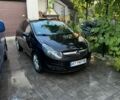 Черный Опель Корса, объемом двигателя 1.23 л и пробегом 250 тыс. км за 4000 $, фото 1 на Automoto.ua