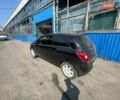 Черный Опель Корса, объемом двигателя 1.3 л и пробегом 200 тыс. км за 4500 $, фото 4 на Automoto.ua