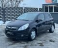 Черный Опель Корса, объемом двигателя 1.23 л и пробегом 302 тыс. км за 4200 $, фото 1 на Automoto.ua