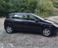 Черный Опель Корса, объемом двигателя 1.23 л и пробегом 170 тыс. км за 4000 $, фото 6 на Automoto.ua