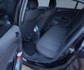 Черный Опель Корса, объемом двигателя 1.25 л и пробегом 234 тыс. км за 4000 $, фото 4 на Automoto.ua