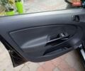 Черный Опель Корса, объемом двигателя 1.4 л и пробегом 178 тыс. км за 6600 $, фото 3 на Automoto.ua