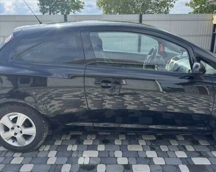 Черный Опель Корса, объемом двигателя 1.23 л и пробегом 230 тыс. км за 4300 $, фото 3 на Automoto.ua