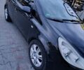 Черный Опель Корса, объемом двигателя 1.25 л и пробегом 234 тыс. км за 4000 $, фото 7 на Automoto.ua