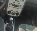Черный Опель Корса, объемом двигателя 1.2 л и пробегом 260 тыс. км за 3900 $, фото 6 на Automoto.ua