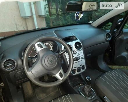 Черный Опель Корса, объемом двигателя 1 л и пробегом 225 тыс. км за 4700 $, фото 29 на Automoto.ua