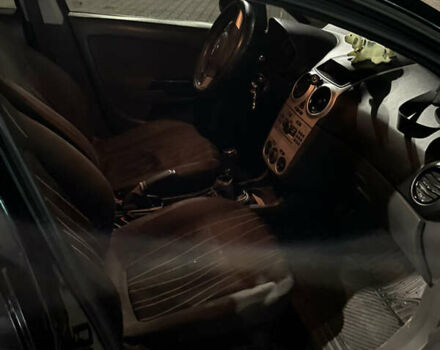 Чорний Опель Корса, об'ємом двигуна 1.23 л та пробігом 160 тис. км за 3500 $, фото 16 на Automoto.ua