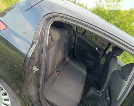 Черный Опель Корса, объемом двигателя 1.3 л и пробегом 233 тыс. км за 3599 $, фото 14 на Automoto.ua