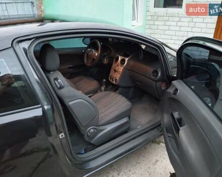 Черный Опель Корса, объемом двигателя 1 л и пробегом 225 тыс. км за 4700 $, фото 3 на Automoto.ua