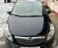 Черный Опель Корса, объемом двигателя 1.2 л и пробегом 240 тыс. км за 5199 $, фото 1 на Automoto.ua