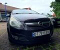 Черный Опель Корса, объемом двигателя 1.3 л и пробегом 256 тыс. км за 4800 $, фото 1 на Automoto.ua