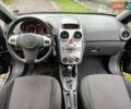 Черный Опель Корса, объемом двигателя 1.4 л и пробегом 174 тыс. км за 7600 $, фото 10 на Automoto.ua