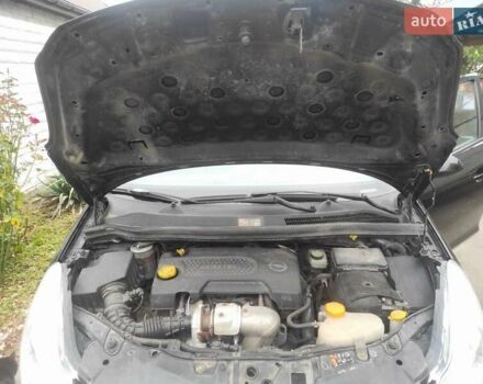 Черный Опель Корса, объемом двигателя 1.23 л и пробегом 223 тыс. км за 4800 $, фото 6 на Automoto.ua