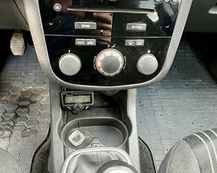 Чорний Опель Корса, об'ємом двигуна 1.23 л та пробігом 239 тис. км за 4599 $, фото 14 на Automoto.ua