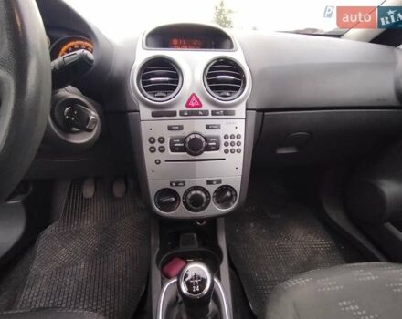 Черный Опель Корса, объемом двигателя 1.23 л и пробегом 223 тыс. км за 4800 $, фото 11 на Automoto.ua