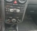 Опель Корса 2011 в Черновцах на Automoto.ua Черный Опель Корса, объемом двигателя 1.23 л и пробегом 255 тыс. км за 4200 $, фото 14 на Automoto.ua