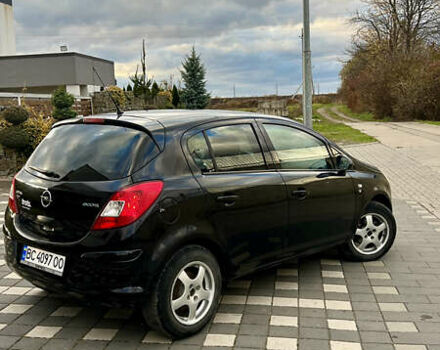 Чорний Опель Корса, об'ємом двигуна 1.23 л та пробігом 239 тис. км за 4599 $, фото 6 на Automoto.ua