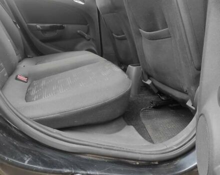 Черный Опель Корса, объемом двигателя 1.23 л и пробегом 223 тыс. км за 4800 $, фото 8 на Automoto.ua