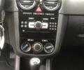 Черный Опель Корса, объемом двигателя 1.3 л и пробегом 174 тыс. км за 6150 $, фото 11 на Automoto.ua