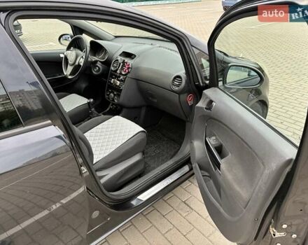 Черный Опель Корса, объемом двигателя 1.2 л и пробегом 225 тыс. км за 4500 $, фото 13 на Automoto.ua