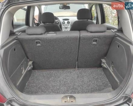 Черный Опель Корса, объемом двигателя 1.23 л и пробегом 223 тыс. км за 4800 $, фото 5 на Automoto.ua