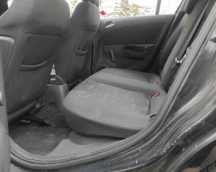 Черный Опель Корса, объемом двигателя 1.23 л и пробегом 223 тыс. км за 4800 $, фото 7 на Automoto.ua