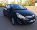 Черный Опель Корса, объемом двигателя 1.23 л и пробегом 187 тыс. км за 5600 $, фото 1 на Automoto.ua