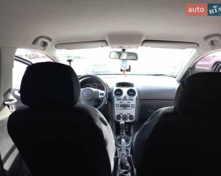 Черный Опель Корса, объемом двигателя 1.3 л и пробегом 255 тыс. км за 5000 $, фото 2 на Automoto.ua