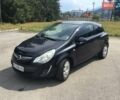 Черный Опель Корса, объемом двигателя 1.23 л и пробегом 208 тыс. км за 5000 $, фото 1 на Automoto.ua