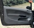 Черный Опель Корса, объемом двигателя 1.25 л и пробегом 134 тыс. км за 3900 $, фото 13 на Automoto.ua