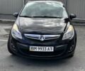 Черный Опель Корса, объемом двигателя 1.2 л и пробегом 167 тыс. км за 5500 $, фото 1 на Automoto.ua