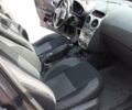 Черный Опель Корса, объемом двигателя 1.3 л и пробегом 255 тыс. км за 5000 $, фото 3 на Automoto.ua