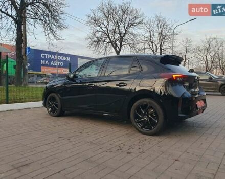 Черный Опель Корса, объемом двигателя 1.2 л и пробегом 9 тыс. км за 14999 $, фото 4 на Automoto.ua
